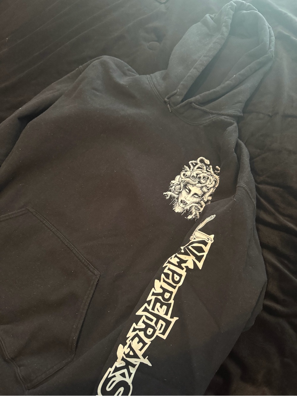 Black Graphic Hoodie with White Medusa Chest and Sleeve Script
